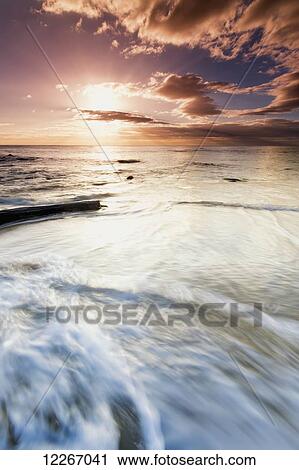 Sunrise from Lydgate Beach Park; Lydgate, Kauai, Hawaii, United States of America View Large Photo Image Stock Image - Sunrise from Lydgate Beach Park; Lydgate, Kauai, Hawaii, United States of America. Fotosearch