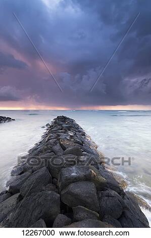 Sunrise in Kapaa looking out over breakwater; Kapaa, Kauai, Hawaii, United States of America View Large Photo Image Stock Image - Sunrise in Kapaa looking out over breakwater; Kapaa, Kauai, Hawaii, United States of America. Fotosearch