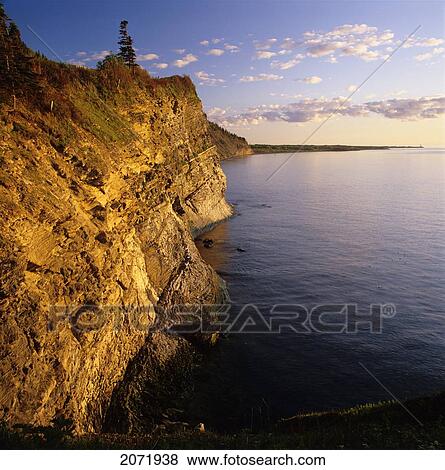 Sunrise On A Cliff At The West Of Cap-Bon-Ami, Forillon National Park, Gaspe Coast, Quebec View Large Photo Image Stock Photo - Sunrise On A Cliff At The West Of Cap-Bon-Ami, Forillon National Park, Gaspe Coast, Quebec. Fotosearch
