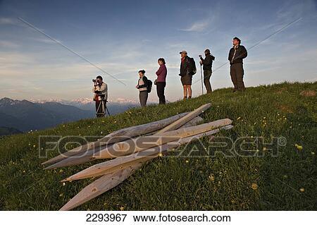 Stock Photo - Sunrise on the mountain from the top of Kitzb. Fotosearch