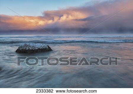 Stock Image - Sunrise Over The Atlantic Ocean; Iceland. Fotosearch