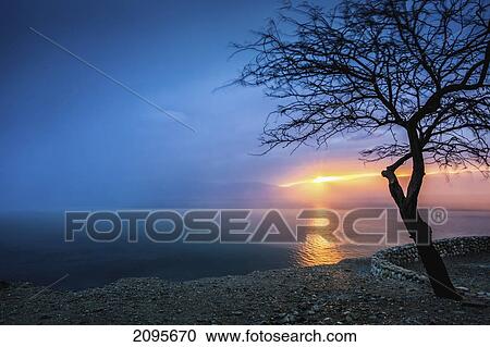 Stock Image - Sunrise Over The Dead Sea; Israel. Fotosearch