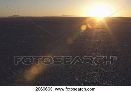 Stock Image - Sunrise Over The Salar De Uyuni, The World's Largest Salt Flat, Potosi Department, Bolivia. Fotosearch