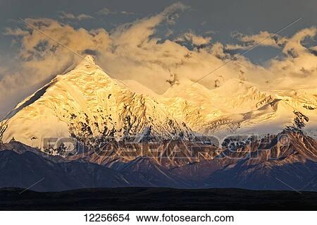 Sunset alpenglow on Mt. Brooks, Denali National Park & Preserve, Interior Alaska, Summer View Large Photo Image Picture - Sunset alpenglow on Mt. Brooks, Denali National Park & Preserve, Interior Alaska, Summer. Fotosearch