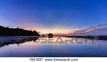 Stock Photo - Sunset At Nai Yang Beach; Phuket Thailand. Fotosearch