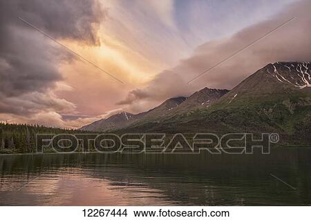 Sunset colour over King's Throne and Kathleen Lake; Yukon, Canada View Large Photo Image Picture - Sunset colour over King's Throne and Kathleen Lake; Yukon, Canada. Fotosearch