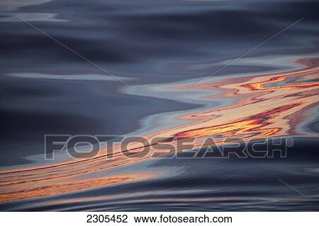 Stock Image - Sunset during late summer on west coast; Greenland. Fotosearch