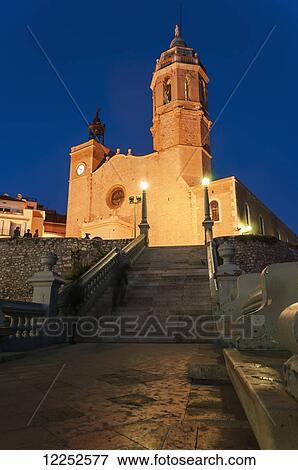 Sunset in the beautiful Sitges downtown, village near to Barcelona; Sitges, Spain View Large Photo Image Stock Photo - Sunset in the beautiful Sitges downtown, village near to Barcelona; Sitges, Spain. Fotosearch