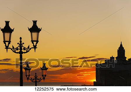 Sunset in the beautiful Sitges downtown, village near to Barcelona; Sitges, Spain View Large Photo Image Stock Photography - Sunset in the beautiful Sitges downtown, village near to Barcelona; Sitges, Spain. Fotosearch