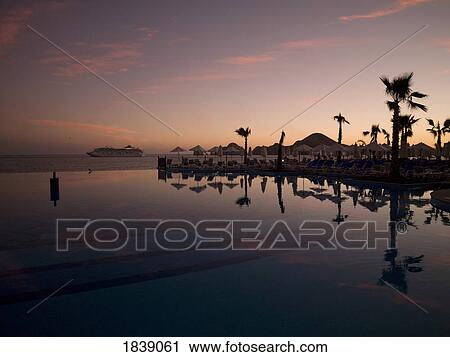 Sunset On Empty Beach In Cabos San Lucas; Los Cabos, Mexico View Large Photo Image Stock Image - Sunset On Empty Beach In Cabos San Lucas; Los Cabos, Mexico. Fotosearch