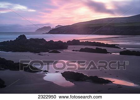 Stock Image - Sunset on Saint Finan's Bay; Iveragh Peninsula, County Kerry, Ireland, UK. Fotosearch
