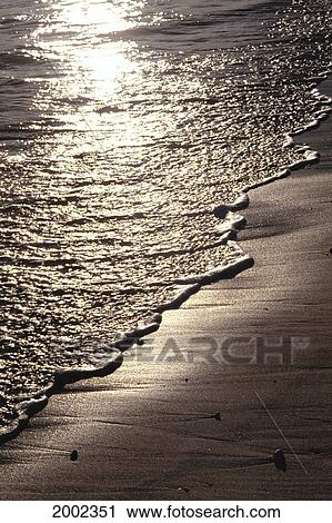 Sunset On The Shimmery Shoreline Waters View Large Photo Image Stock Image - Sunset On The Shimmery Shoreline Waters. Fotosearch