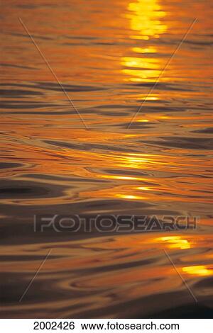Sunset Orange And Gold Reflections On Smooth Ocean Surface View Large Photo Image Stock Photograph - Sunset Orange And Gold Reflections On Smooth Ocean Surface. Fotosearch