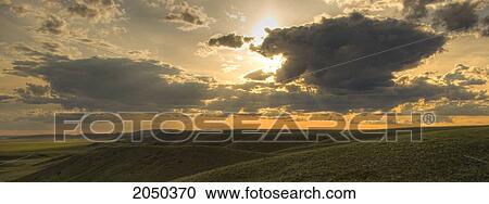 Stock Image - Sunset Over Grasslands National Park, Saskatchewan. Fotosearch