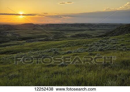 Sunset over Killdeer Badlands in Grasslands National Park; Saskatchewan, Canada View Large Photo Image Stock Photo - Sunset over Killdeer Badlands in Grasslands National Park; Saskatchewan, Canada. Fotosearch