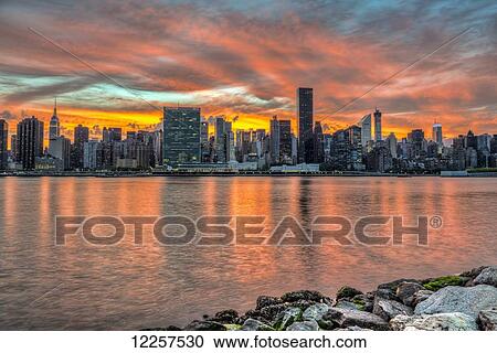 Sunset over Manhattan, Gantry Plaza; Long Island City, New York, United States of America View Large Photo Image Stock Image - Sunset over Manhattan, Gantry Plaza; Long Island City, New York, United States of America. Fotosearch