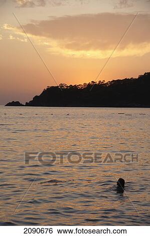 Sunset Over Oludeniz, The Turquoise Coast, Southern Turkey View Large Photo Image Stock Photograph - Sunset Over Oludeniz, The Turquoise Coast, Southern Turkey. Fotosearch
