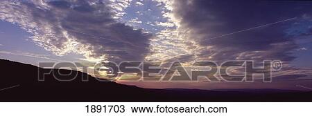 Stock Image - Sunset Over Rombauds Moor, Near Ilkley. Fotosearch