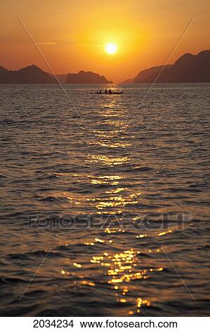 Sunset Over The Mountainous Coast; Corong Corong Bacuit Archipelago Palawan Philippines View Large Photo Image Picture - Sunset Over The Mountainous Coast; Corong Corong Bacuit Archipelago Palawan Philippines. Fotosearch