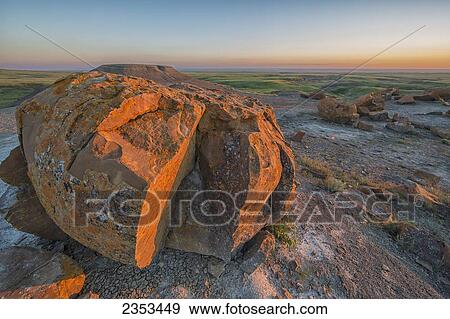 Sunset Over The Rocks At Red Rock Coulee; Alberta, Canada View Large Photo Image Stock Photo - Sunset Over The Rocks At Red Rock Coulee; Alberta, Canada. Fotosearch