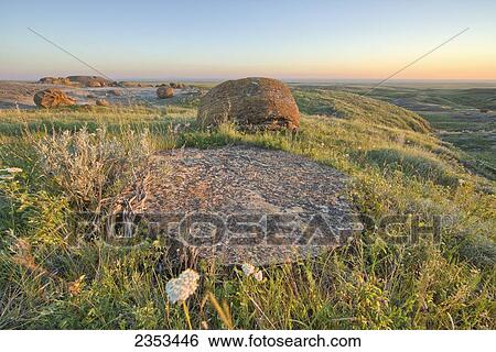 Sunset Over The Rocks At Red Rock Coulee; Alberta, Canada View Large Photo Image Stock Photograph - Sunset Over The Rocks At Red Rock Coulee; Alberta, Canada. Fotosearch
