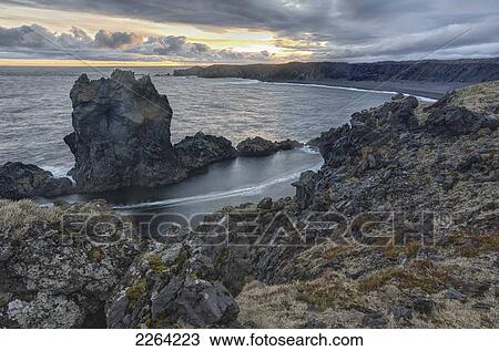 Sunset over the rocky beach of djupalonssandur; iceland View Large Photo Image Stock Image - Sunset over the rocky beach of djupalonssandur; iceland. Fotosearch