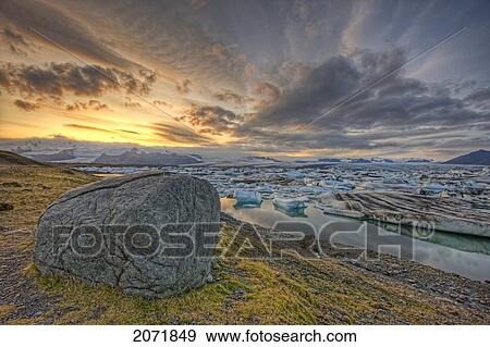 Stock Photo - Sunset Over Tundra And The Glacial Lagoon, Southern Iceland. Fotosearch