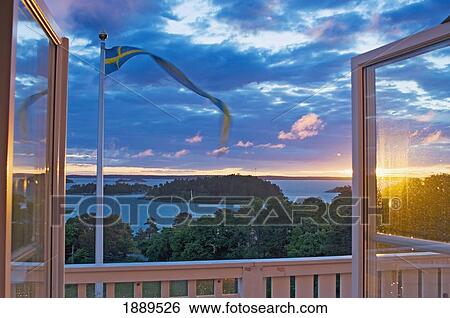 Sunset Over Uto Island's Harbour. View Large Photo Image Stock Photograph - Sunset Over Uto Island's Harbour.. Fotosearch