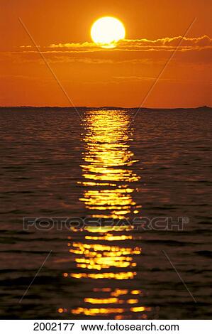 Sunset Reflections On Dark Ocean Water, Sun Ball In Orange Sky View Large Photo Image Stock Photo - Sunset Reflections On Dark Ocean Water, Sun Ball In Orange Sky. Fotosearch