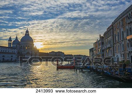 Stock Image - Sunset viewed from the Grand Canal; Venice, Veneto, Italy. Fotosearch