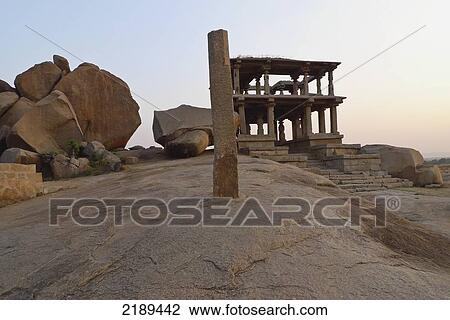 Sunset With Ruins On Hemakuta Hill In Hampi, Karnataka, India View Large Photo Image Stock Image - Sunset With Ruins On Hemakuta Hill In Hampi, Karnataka, India. Fotosearch