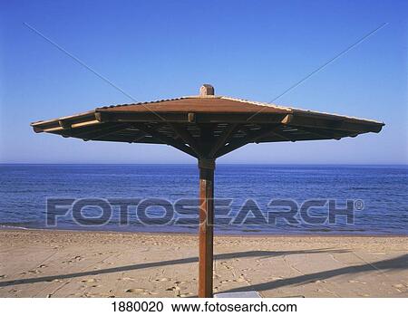 Stock Image - Sunshade On Beach At Oberoi Sahl Hasheesh Resort. Fotosearch