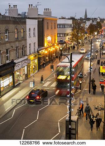 Surbiton High Street at dusk; Surrey, England View Large Photo Image Stock Photograph - Surbiton High Street at dusk; Surrey, England. Fotosearch