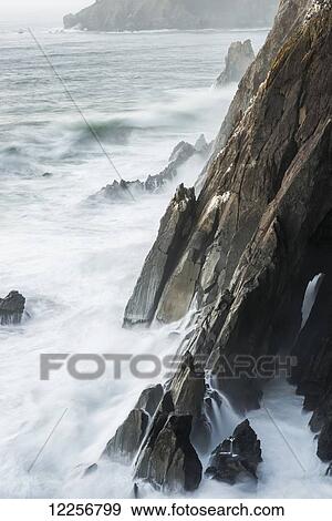 Surf breaks on the rocks; Manzanita, Oregon, United States of America View Large Photo Image Stock Photo - Surf breaks on the rocks; Manzanita, Oregon, United States of America. Fotosearch