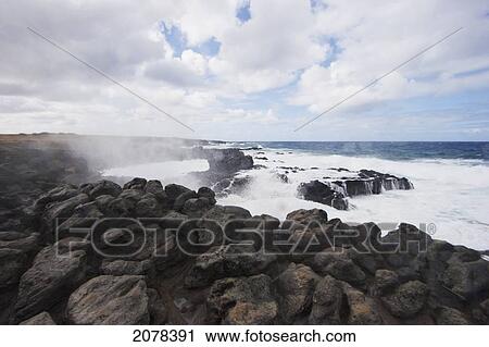 Stock Image - Surf By The Volcanic Beach At Hanga Poukura, Rapa Nui (Easter Island), Chile. Fotosearch