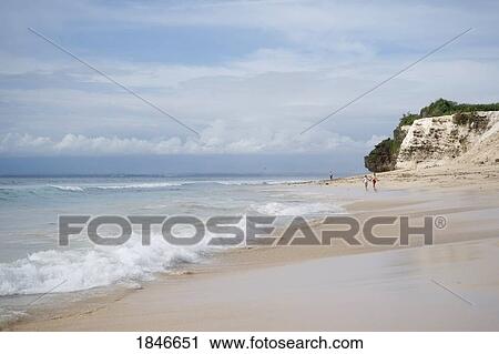Stock Image - Surf Crashing On Beach. Fotosearch