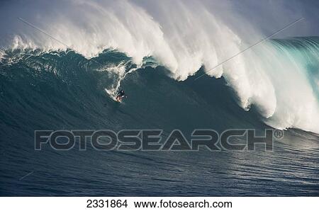 Surfers at 'Jaws'; Maui, Hawaii, United States of America View Large Photo Image Picture - Surfers at 'Jaws'; Maui, Hawaii, United States of America. Fotosearch