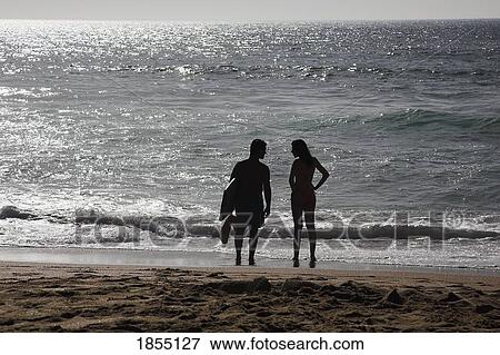 Stock Photo - Surfers, Guincho Beach, Portugal. Fotosearch
