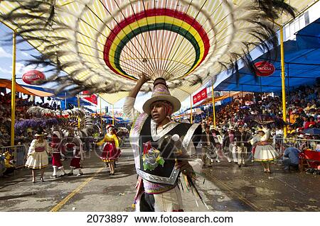 Suri Sicuri Dancer Wearing An Elaborate Feather Headdress In The Procession Of The Carnaval De Oruro, Oruro, Bolivia View Large Photo Image Stock Photo - Suri Sicuri Dancer Wearing An Elaborate Feather Headdress In The Procession Of The Carnaval De Oruro, Oruro, Bolivia. Fotosearch