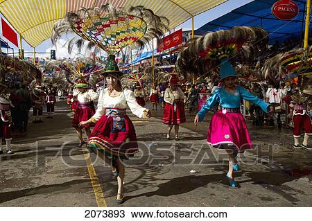 Suri Sicuri Dancers Wearing Elaborate Feather Headdress In The Procession Of The Carnaval De Oruro, Oruro, Bolivia View Large Photo Image Stock Image - Suri Sicuri Dancers Wearing Elaborate Feather Headdress In The Procession Of The Carnaval De Oruro, Oruro, Bolivia. Fotosearch