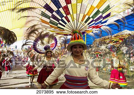 Suri Sicuri Dancers Wearing Elaborate Feather Headdress In The Procession Of The Carnaval De Oruro, Oruro, Bolivia View Large Photo Image Stock Photography - Suri Sicuri Dancers Wearing Elaborate Feather Headdress In The Procession Of The Carnaval De Oruro, Oruro, Bolivia. Fotosearch