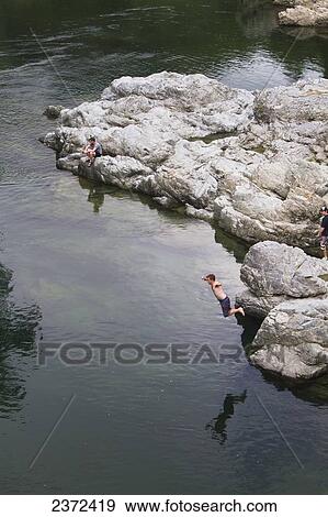 Stock Photo - Swimming In One Of The Various Rivers Running Through The Tasman Region Of New Zealand; Abel Tasman, New Zealand. Fotosearch