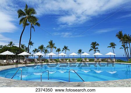 Stock Image - Swimming pool at a resort on the South Kohala Coast; Big Island, Hawaii, United States of America. Fotosearch