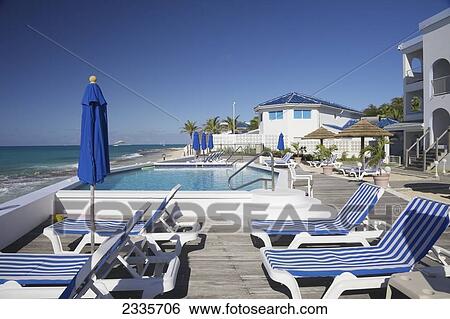 Stock Photograph - Swimming Pool At A Tropical Resort On The Water's Edge, Simpson Bay; Sint Maarten, Dutch West Indies. Fotosearch
