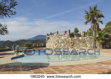 Stock Image - Swimming Pool, Malaga, Andalucia, Spain. Fotosearch