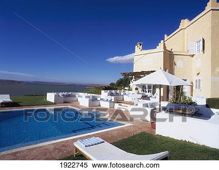 Swimming Pool Outside Luxury Home View Large Photo Image Stock Photography - Swimming Pool Outside Luxury Home. Fotosearch