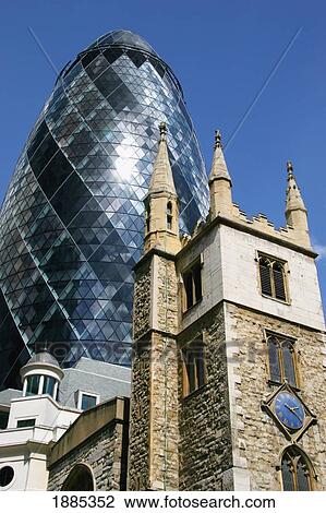 Swiss Re Tower And St. Mary Axe Church View Large Photo Image Stock Image - Swiss Re Tower And St. Mary Axe Church. Fotosearch