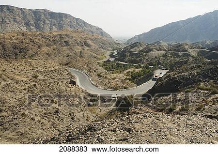 Stock Image - Switch-Back Curve On The Road In The Khyber Pass, Federally Administered Tribal Areas, Pakistan. Fotosearch