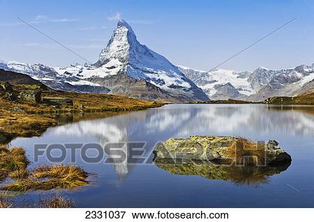 Stock Photo - Switzerland, Stellisee lake and Matterhorn; Valais. Fotosearch