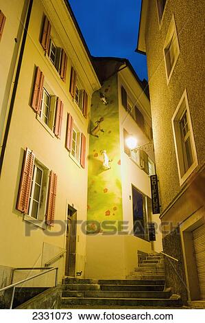 Stock Image - Switzerland, Town street at night; Delemont. Fotosearch